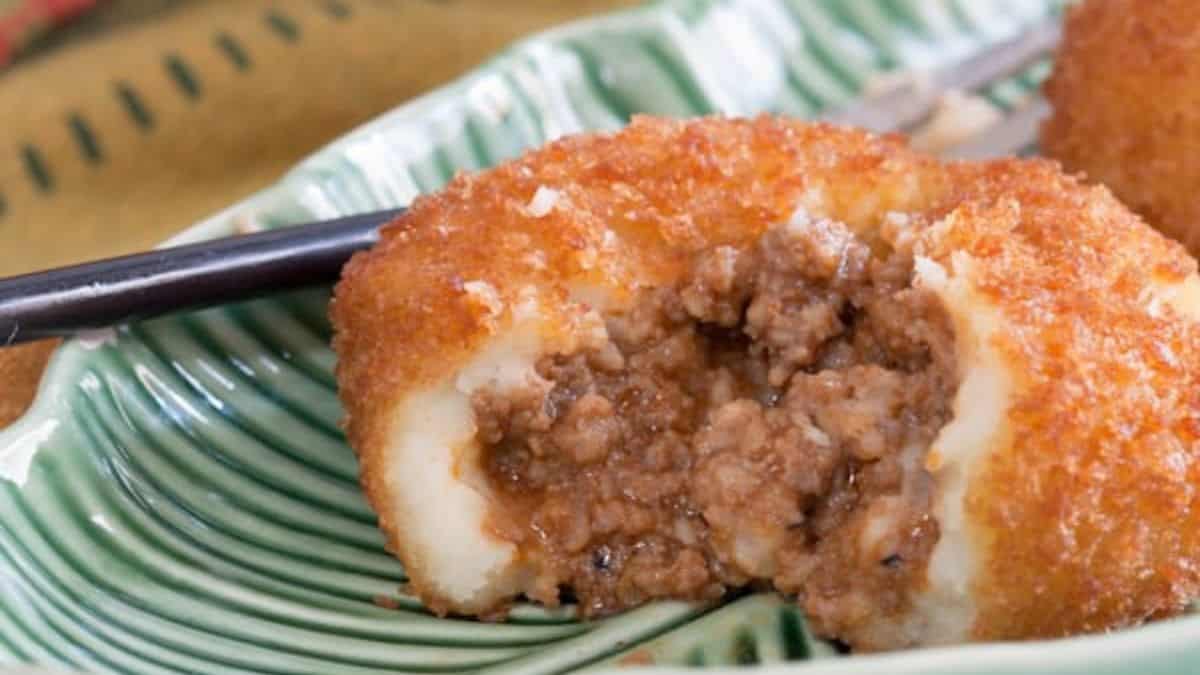 <p>Papas Rellenas are a traditional Cuban snack. The fried mashed potato balls are filled with ground beef and other fillings for a delicious appetizer or main dish. It's easy to adjust these to your liking – no two recipes are exactly the same!</p> <p><strong>Get the recipe: <a href="https://whatagirleats.com/papas-rellenas">Papas Rellenas</a><br> </strong></p>