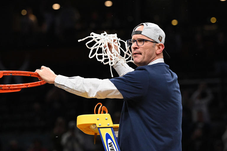Mar 30, 2024; Boston, MA, USA; Connecticut Huskies head coach Dan Hurley cuts the net after defeating the Illinois Fighting Illini in the finals of the East Regional of the 2024 NCAA Tournament at TD Garden.