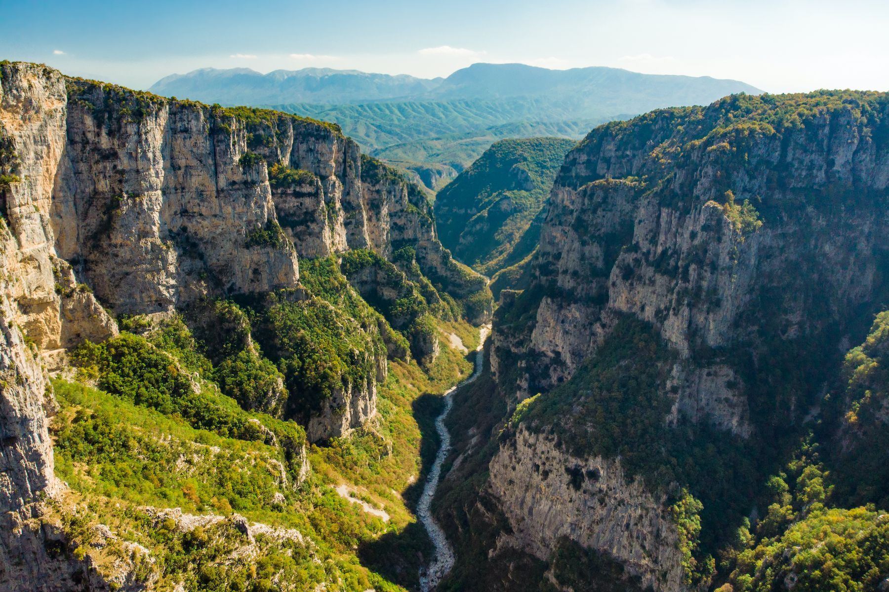 Located in northwestern Greece, the <a href="https://www.discovergreece.com/activities-tours/vikos-gorge-hike" rel="noreferrer noopener">Vikos Gorge</a> is sure to delight outdoor enthusiasts. The canyon’s vertiginous walls are among the deepest in the world, offering hikers truly magnificent scenery. Visitors may also wish to appreciate majestic Vikos from the <a href="https://expertworldtravel.com/hike/greece/beloi-viewpoint/" rel="noreferrer noopener">Beloi Viewpoint</a>, where they’ll enjoy amazing views of the surrounding villages. Located in the 12,000-hectare (49-square-mile) Vikos-Aoos National Park, this natural gem has been a <a href="https://en.unesco.org/global-geoparks/vikos-aoos" rel="noreferrer noopener">UNESCO</a> World Heritage site since 2015.
