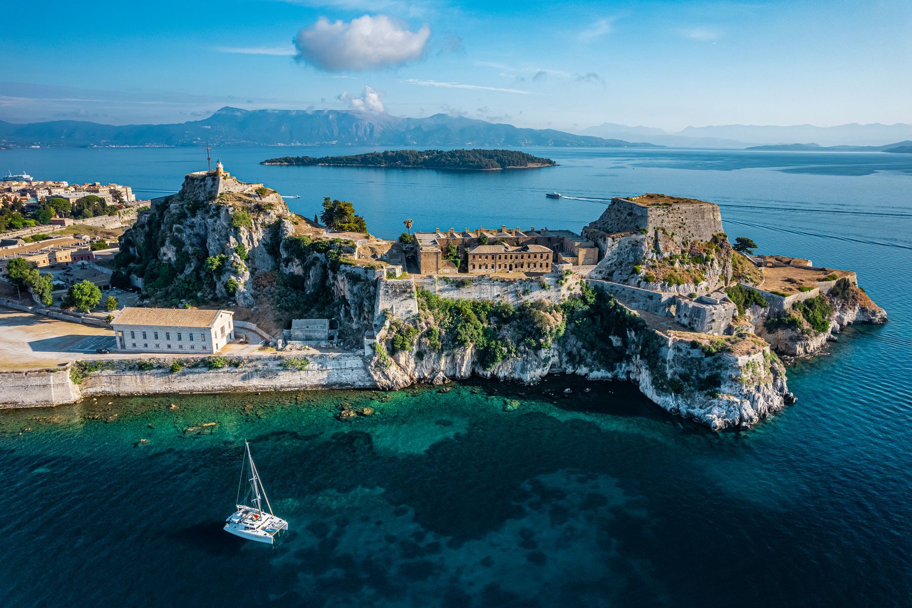 This <a href="https://www.discovergreece.com/ionian-islands/corfu" rel="noreferrer noopener">jewel</a> of the Ionian Sea entices travellers with its stunning sea views and romantic old town streets, listed as a <a href="https://whc.unesco.org/en/list/978/" rel="noreferrer noopener">UNESCO</a> World Heritage site. What’s more, Paleokastritsa and other idyllic beaches, alongside the island’s <a href="https://www.greeka.com/ionian/corfu/" rel="noreferrer noopener">colourful architecture</a> with Italian, French, and British influences, provide the perfect backdrop for a romantic getaway. It’ll make you wish time would stop.