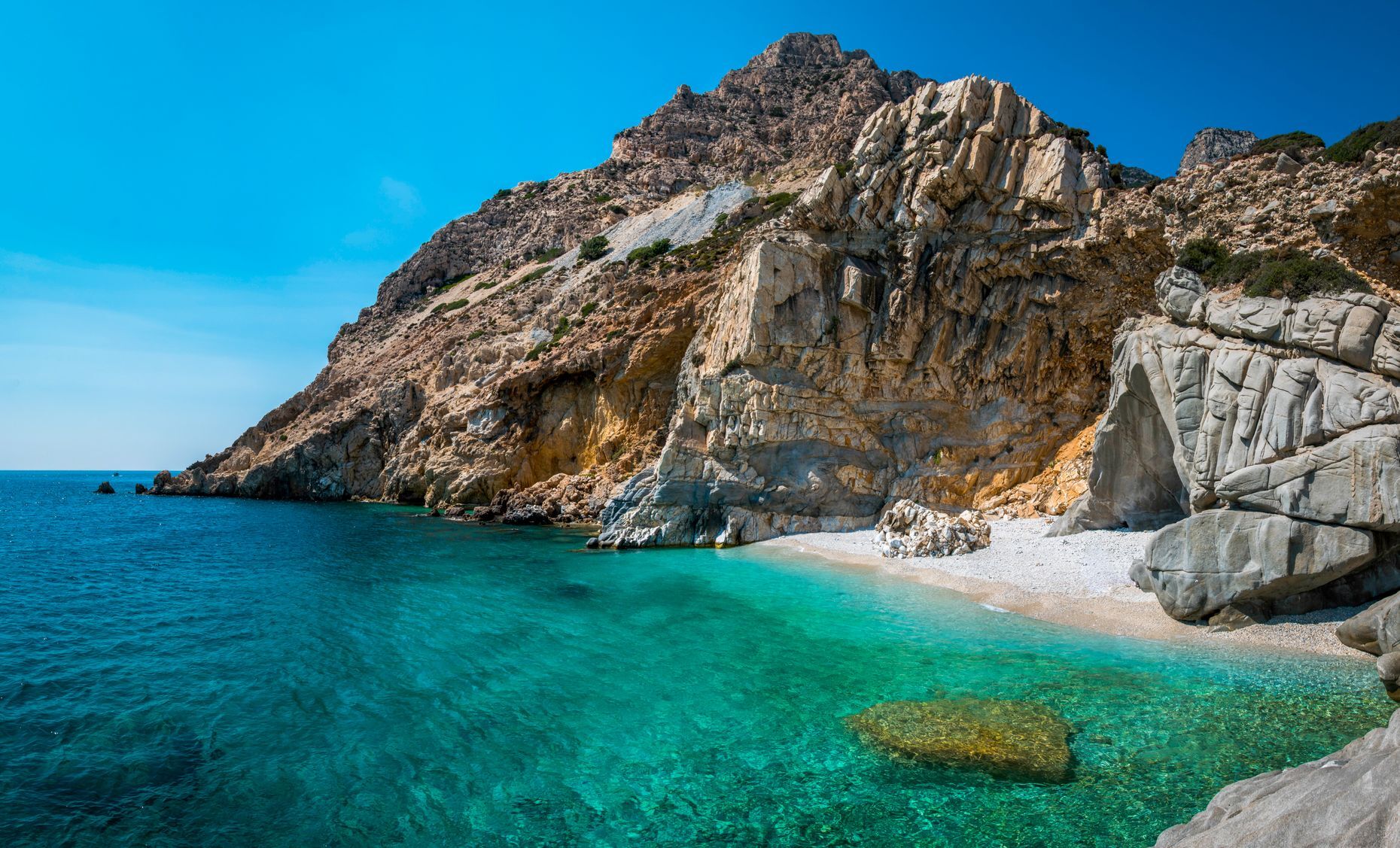 <a href="https://www.discovergreece.com/north-aegean-islands/ikaria" rel="noreferrer noopener">Ikaria</a> is a peaceful island in the North Aegean, perfect for a tranquil escape within the heart of Greece. Indeed, <a href="https://www.greeka.com/eastern-aegean/ikaria/beaches/nas/" rel="noreferrer noopener">Nas</a>, <a href="https://www.visitikaria.gr/en/discover/beaches/seychelles" rel="noreferrer noopener">Seychelles</a>, and other spectacular beaches are true havens of peace and unspoiled nature. Renowned for the <a href="https://www.businessinsider.com/ikaria-greece-blue-zone-and-its-longevity-secrets-2023-9" rel="noreferrer noopener">longevity of its inhabitants</a>, Ikaria also offers delicious, healthy local cuisine and thermal springs where visitors can relax and unwind.