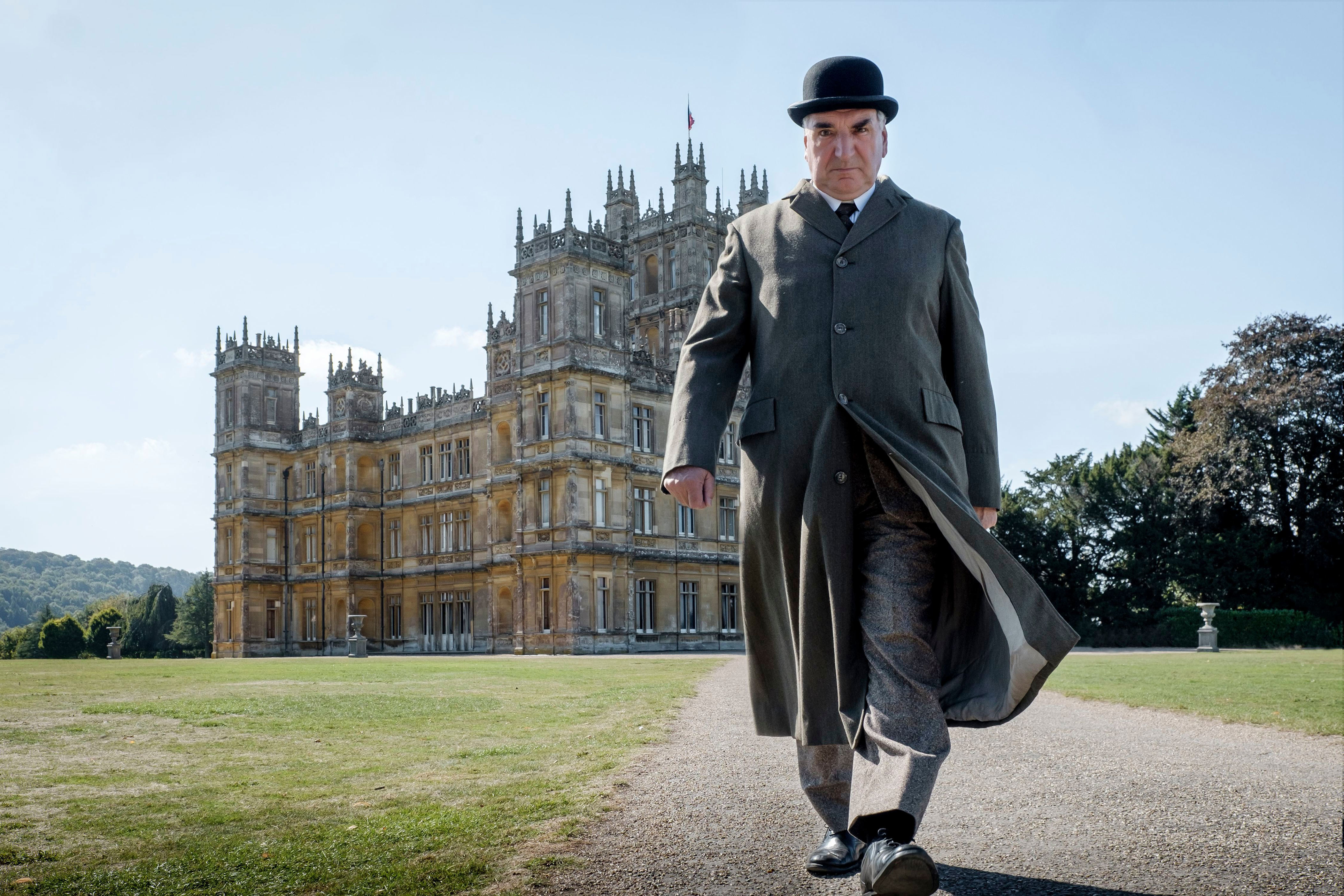 <p>Retired butler Charles Carson might not be an aristocrat, but he never has a thread out of place no matter when or where he is. He's seen here on a poster for the 2019 "Downton Abbey" movie.</p>