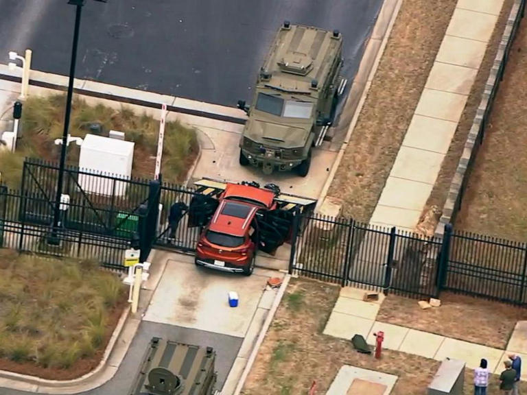 Driver rams into front gate of Atlanta FBI office, taken into custody