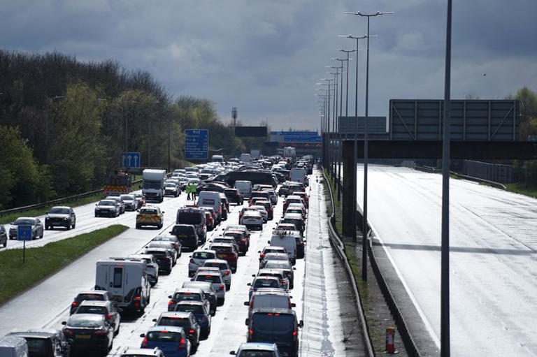 M60 crash: Woman seriously hurt after being knocked down while helping ...