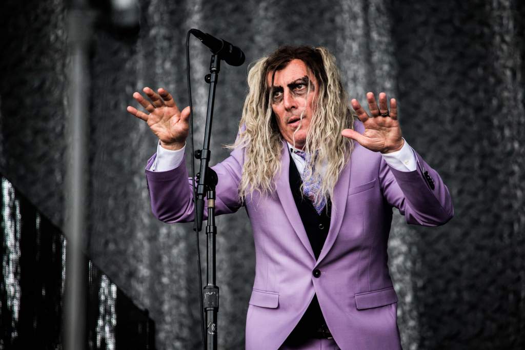 Maynard James Keenan (born James Herbert Keenan) is the frontman of <em>A Perfect Circle</em> and <em>Tool.</em> A progressive metal band, <em>Tool</em> essentially created their genre of music. With lyrical themes of spirituality, identity, and transcendence, Keenan’s command of language is possibly even more impressive than his understanding of rhythm and melody. Layered and complex, Keenan evokes feelings of disgust, disdain, anger, and lust seemingly with ease through his singing. After a thirteen-year hiatus, Tool put out the highly anticipated album “Fear Innoculum” in August of 2019.