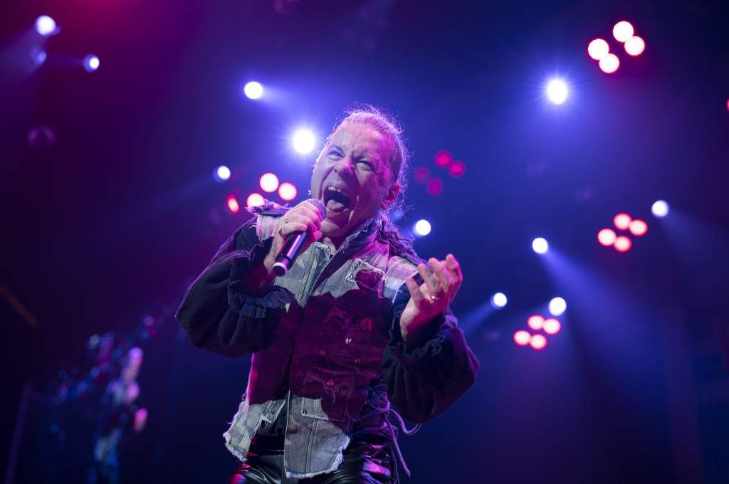 The heavy metal operatic vocal stylings of Bruce Dickinson -- lead singer of <em>Iron Maiden</em> -- make him a no-brainer as one of Rock N' Roll’s top vocalists. With an impressive vocal range of over four octaves, Dickinson joined <em>Iron Maiden</em> in 1981 (replacing original lead singer Paul Di’Anno). During a 2003 festival performance, Dickinson held an astonishing 41-second note -- a seemingly impossible feat that will leave you gasping for air just listening to it.