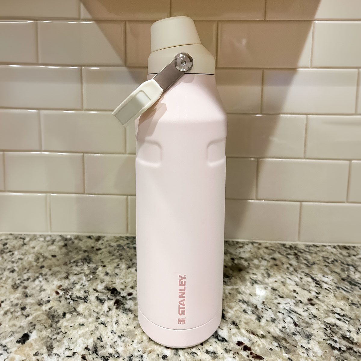 <h3>Stanley Iceflow with Fast Flow Lid</h3> <p class="elementToProof">Our Senior Editor Caroline Lubinsky tested the <a href="https://www.stanley1913.com/products/the-iceflow-aerolight-water-bottle-fast-flow-24-oz" rel="noopener">Stanley IceFlow <span>Bottle</span></a> in the 55-ounce size. This <span>bottle</span> has a helpful carrying handle, which the cap clips onto when drinking <span>water</span>. Despite the lightweight material—spun steel is about 30% more lightweight than the usual 18/8 stainless steel—double-wall insulation keeps drinks iced for up to two days.</p> <p class="elementToProof">"I own a Yeti in the same size, and think the Stanley is decidedly lighter (which is a big plus to me)," says Lubinsky. "Other things I like about this <span>bottle</span> include the double-walled construction, which helps the <a href="https://www.familyhandyman.com/list/countertop-ice-makers/">ice</a> stay cold for literal days, and the large variety of color options available."</p> <p><strong>Size(s):</strong> 16 oz., 24 oz., 36 oz., 50 oz., 96 oz. <strong>| Lid(s): </strong>Fast Flow Lid, <a href="https://www.stanley1913.com/products/iceflow-replacement-lid-17-oz-22-oz" rel="noopener">Ice Flow Flip Straw Lid</a> (Sold Separately)<strong> | Dishwasher Safe: </strong>Yes<strong> | Material:</strong> Spun Stainless Steel<strong> | Hot Liquids: </strong>No</p> <p><strong>Pros</strong></p> <ul> <li> <div class="elementToProof">Available in four sizes</div> </li> <li> <div class="elementToProof">Lots of color options</div> </li> <li> <div class="elementToProof">Leakproof</div> </li> <li> <div class="elementToProof">Dishwasher safe</div> </li> <li> <div class="elementToProof">Lifetime warranty</div> </li> <li> <div class="elementToProof">Lightweight for the size</div> </li> <li> <div class="elementToProof">Keeps ice cold for days</div> </li> </ul> <p><strong>Cons</strong></p> <ul> <li>Dents fairly easily</li> <li>55-ounce <span>bottle</span> doesn't fit in cupholders</li> </ul> <p class="listicle-page__cta-button-shop"><a class="shop-btn" href="https://www.stanley1913.com/products/the-iceflow-aerolight-water-bottle-fast-flow-24-oz">Shop on Stanley</a></p> <p class="listicle-page__cta-button-shop"><a class="shop-btn" href="https://www.amazon.com/Stanley-IceFlowTM-Fast-Flow-Bottle/dp/B0CFP3S5R4">Shop on Amazon</a></p> <h2>What<strong> to Consider Before Buying a Reusable Water Bottle</strong></h2> <p>There’s a lot to consider when hunting for the best water bottle. Unlike <a href="https://www.familyhandyman.com/list/best-tumbler/">travel tumblers</a>, traditional water bottles typically aren’t meant to carry hot drinks like coffee. Because of that distinction, it’s advised to stick to bottles rated for both hot and cold beverages if you plan on alternating.</p> <p>Size and lid type are also important aspects of a water bottle. Those who take to the trail for jogs or hiking may find that while travel tumblers are easy to hold, they’re often heavy and don’t usually offer leakproof lids. This is especially important for those who plan on storing their bottle in a hiking bag or backpack. If this water bottle is a <a href="https://www.familyhandyman.com/list/gifts-for-hikers/">gift for a hiker</a>, look for an option that doesn’t have a push-in top or straw.</p> <h2>How We Tested Water Bottles</h2> <p>At <i>Family Handyman</i>, our editors don’t just sit at a desk—we’re always on the move. Our staff has tested countless bottles over the last few years, from hydrating during trail walks to sips between floor sanding. All said we take our drinks seriously when it comes to staying hydrated.</p> <p>We considered the following while testing water bottles for inclusion: the materials, weight, ease of use, aesthetics and how long drinks stay cold in various temperatures and conditions. We’ve even left our water bottles in the car for an entire day to see whether the ice inside has melted. Spoiler: Our best overall came out on top in this regard!</p> <h2>Why You Should Trust Us</h2> <p><span><a class="fui-Link ___1rxvrpe f2hkw1w f3rmtva f1ewtqcl fyind8e f1k6fduh f1w7gpdv fk6fouc fjoy568 figsok6 f1hu3pq6 f11qmguv f19f4twv f1tyq0we f1g0x7ka fhxju0i f1qch9an f1cnd47f fqv5qza f1vmzxwi f1o700av f13mvf36 f1cmlufx f9n3di6 f1ids18y f1tx3yz7 f1deo86v f1eh06m1 f1iescvh fhgqx19 f1olyrje f1p93eir f1nev41a f1h8hb77 f1lqvz6u f10aw75t fsle3fq f17ae5zn" title="https://www.familyhandyman.com/author/emily-way/" href="https://www.familyhandyman.com/author/emily-way/" rel="noreferrer noopener">Emily Way</a> is an Associate Shopping Editor for <i>Family Handyman</i> with experience researching products and recommending the best designs to consumers. She researched and updated this piece. Family Handyman's in-house editorial staff and experts tested and researched every water bottle on this list.</span></p> <p>Way interviewed Dr. Kevin Dwyer of <a href="https://doctors.hackensackmeridianhealth.org/provider/Kevin+Thomas+Dwyer/2470331" rel="noopener">Riverview Medical Center</a>. He received his medical degree from Philadelphia College of Osteopathic Medicine and oversees the Emergency Department. Given his proximity to the Shore, Dr. Dwyer sees dehydration often and is an expert in the risks associated with poor hydration.</p> <h2>FAQ</h2> <h3>How much water should I drink in a day?</h3> <p>“The amount of water you need depends on various factors, including your health, activity levels, and climate," says Dr. Dwyer. "A general guideline is about 3.7 liters for men and 2.7 liters for women per day from all beverages and foods. But this varies, and it’s important to listen to your body and drink when you’re thirsty.”</p> <h3>What is the healthiest water to drink?</h3> <p>“Clinically speaking, the healthiest water is one that maintains a balance of essential minerals while being devoid of harmful contaminants," says Dr. Dwyer. He notes that tap water in most developed countries meets these criteria and is subject to rigorous testing. Whether tap, filtered, or bottled, it should meet safety standards.</p> <p>"Some prefer mineral water for its added nutrients. Flavored water is a fine alternative, but be aware of beverages that are high in sugar as they are associated with obesity and diabetes. Some health experts tout alkaline water for potential health benefits, but more research is needed before this should be recommended over plain water. Ultimately, the best option is what has been available to humans since the beginning of time, just good old plain water.”</p>
