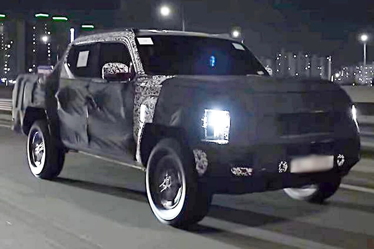 Kia’s Tasman Pickup Truck Teases With Stealthy Nighttime Drive