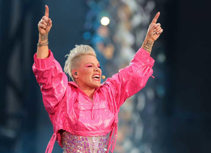 Pink solidified her outspoken attitude in her 2006 album I'm Not Dead, which featured politically charged songs like 'Dear Mr. President,' and included the poignant track 'Conversations with My 13 Year Old Self,' which delved into the struggles of adolescence. However, it was her smash hit single, 'Stupid Girls,' that solidified Pink's status as a feminist icon within the realm of pop music. In this song, she criticized society's obsession with scantily clad women and targeted everything from women in rap music videos to the notion that a woman's sole purpose is to appease men. Pink also openly declared herself a feminist at this time, a bold move that many other female artists like Taylor Swift and Katy Perry didn't dare do until nearly a decade later.