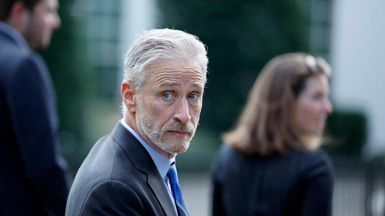 Jon Stewart stands on the North Lawn of the White House in between media interviews on Aug. 10, 2022. Getty Images