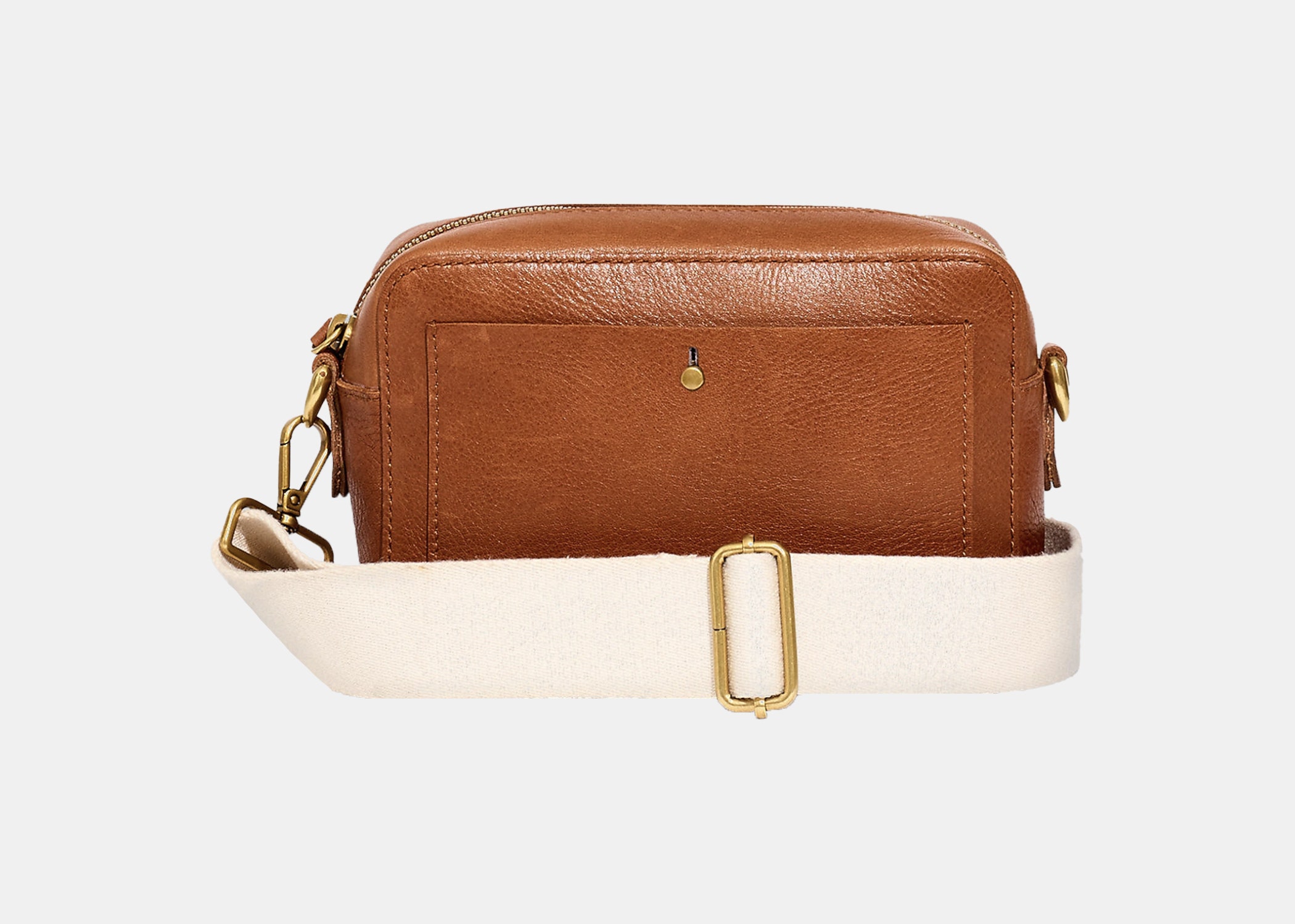 <p><strong>Best camera bag that doesn’t look like a camera bag</strong></p> <p>This classy leather crossbody from Madewell is perfectly suited for taking a point-and-shoot camera along for the adventure when you're city traveling, but it’s also cute enough to serve as a bag when you leave your device at home. Available in a warm chestnut as well as a glossy black, the vegetable-dyed leather is unique to each bag. We love that there are two strap options to choose from: one skinny leather strap, and one wide fabric strap in a crisp white.</p> <p><strong>Noteworthy features:</strong> Multifunctional, exterior slide pocket for your phone</p> $128, Amazon. <a href="https://www.amazon.com/Madewell-Transport-Camera-True-Black/dp/B08J81P52J">Get it now!</a><p>Sign up to receive the latest news, expert tips, and inspiration on all things travel</p><a href="https://www.cntraveler.com/newsletter/the-daily?sourceCode=msnsend">Inspire Me</a>