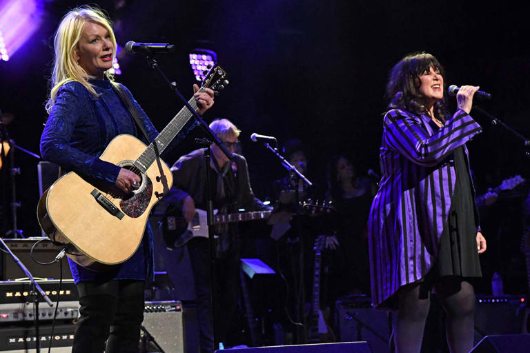 Kevin Mazur/Getty Nancy Wilson and Ann Wilson of Heart performing at the Love Rocks NYC Benefit Concert on March 7, 2019