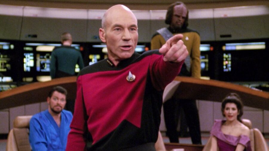 <p>Before anyone hits me with a phaser set to kill, I’d like to clarify that I love Patrick Stewart as an actor and as a man, and I think Captain Picard is one of the most compelling characters in television history. </p><p>However, I can’t ignore that Stewart himself has helped to personally dismantle much of what makes Picard such an awesome character in the first place so he can be seen as a tough guy who kicks butt, drives fast, and always gets the ladies. </p><p>Forget that whole robot body thing in the first season of Star Trek: Picard…in reality, the character died decades ago, and it was Patrick Stewart who pulled the trigger (it was a Tommy gun, naturally) that killed him.</p>