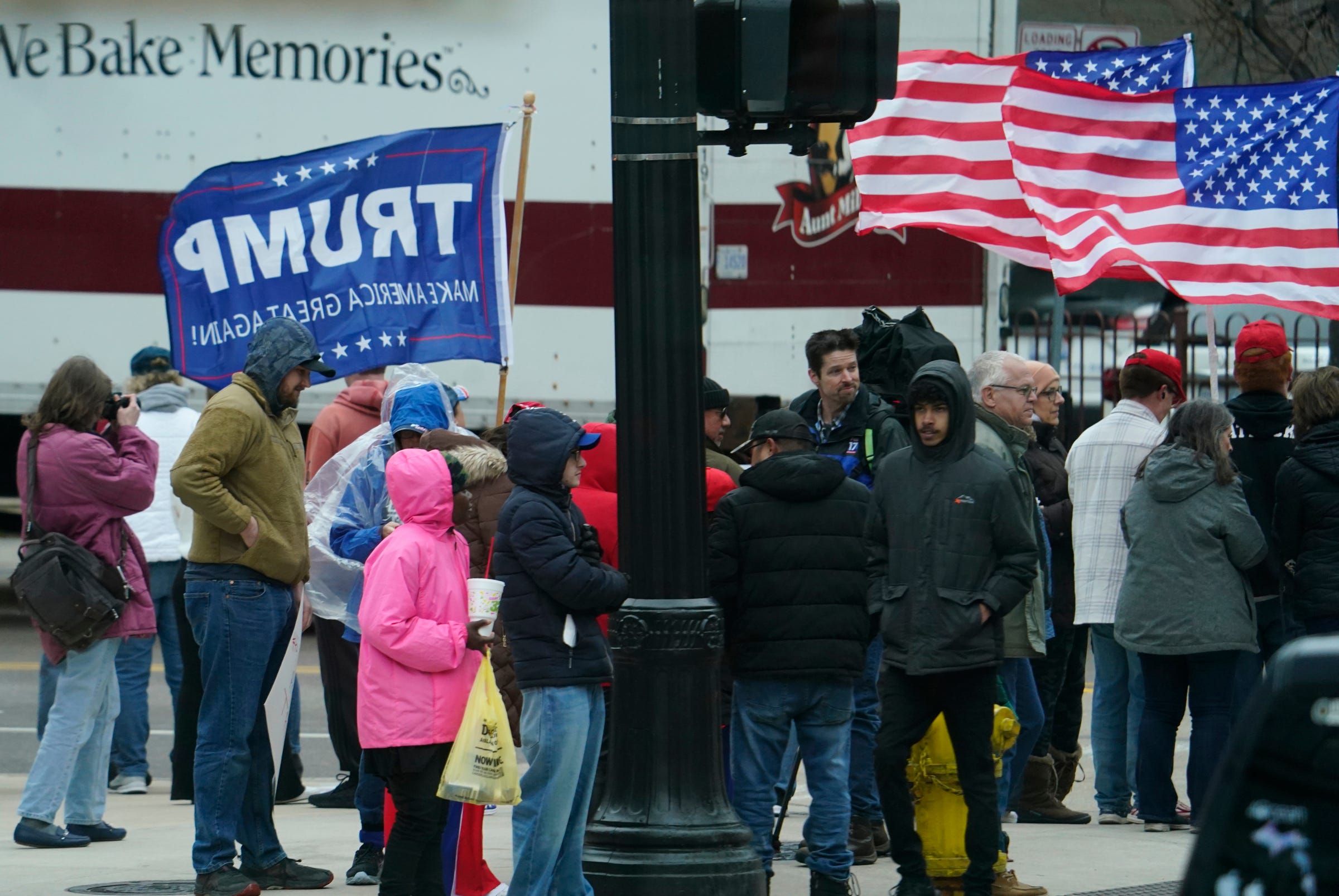 Trump Supporters, Opponents Brave Cold, Rain Ahead Of Grand Rapids ...