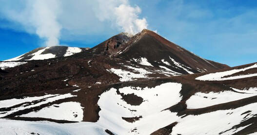 The frequent bursts of steam-and lava-don't deter visitors from navigating the slopes of Sicily's Mt. Etna.