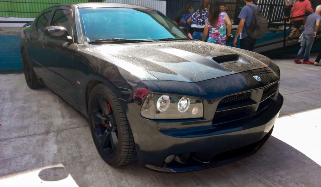 <p>The Challenger made a comeback in the 2000s, and the SRT8 was the top-performance model. With its retro styling and modern Hemi V8, it was a successful blend of old and new.</p>