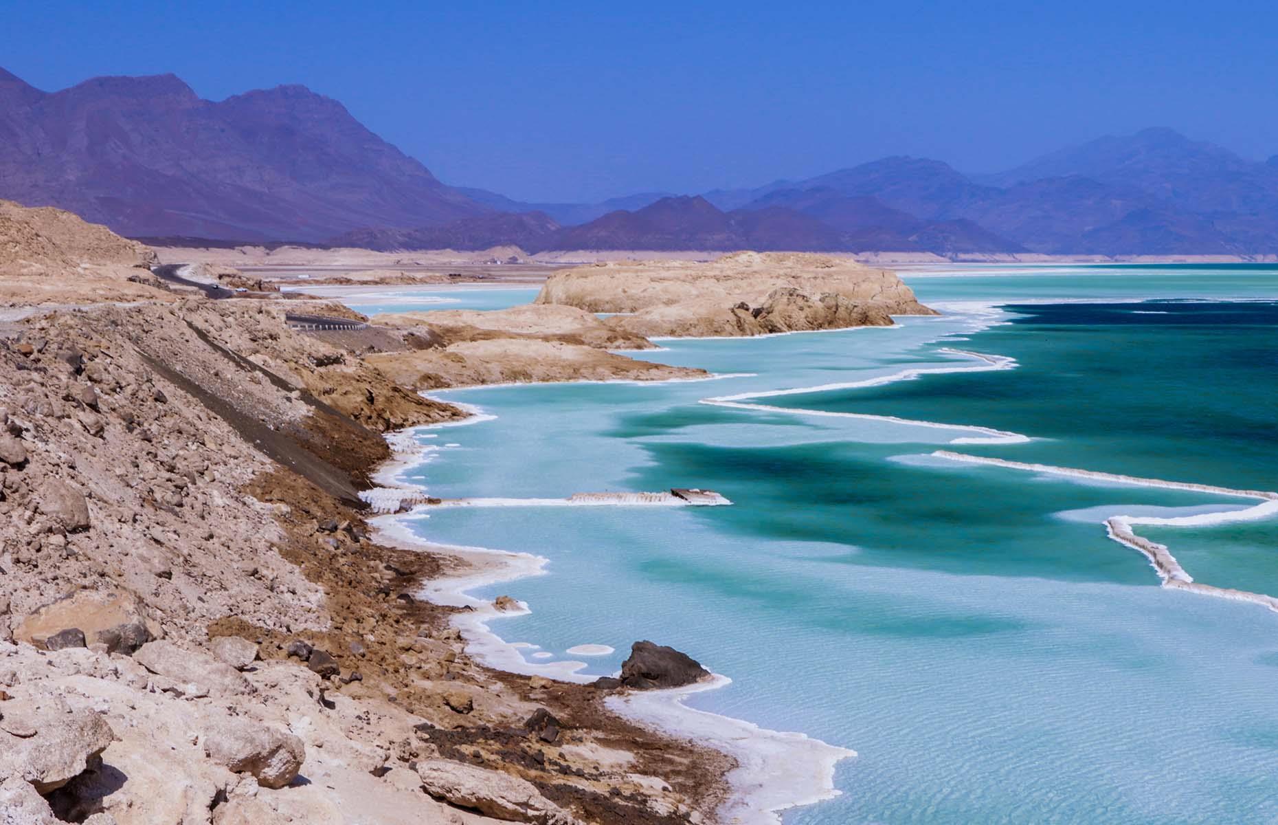 <p>French colonialists established Djibouti City in 1888, and it’s now a vibrant, multicultural capital that showcases the country’s mix of African, Arabic and Asian influences. But it’s Djibouti’s landscapes that really stand out, including salt-rich Lac Assal (pictured), the lowest point in Africa and surrounded by the looming shadows of volcanoes; and the other-worldly plains of Lac Abbe. Travel advisories suggest steering clear of the border area with Eritrea and remaining vigilant against the threats of crime and terrorism when travelling around Djibouti.</p>