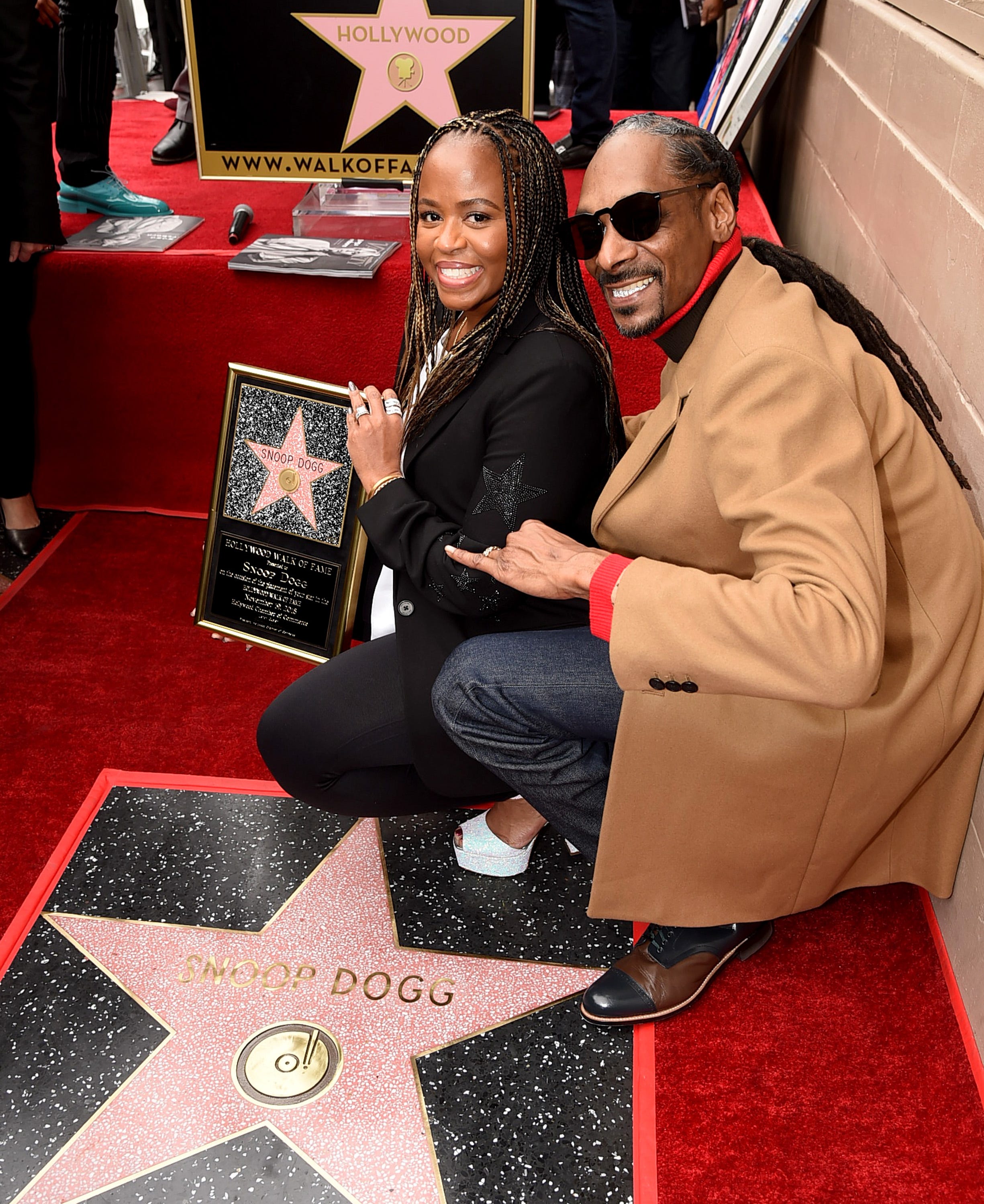 Snoop Dogg and his wife Shante Broadus were all smiles as the rapper and actor was honored with a star on the Hollywood Walk Of Fame on Nov. 19, 2018.