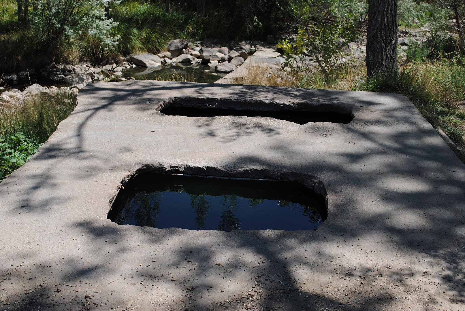 <p>The Montezuma hot springs are privately owned with free public access and parking. It is only a short, easy walk from parking to the springs.</p>  <p>Clothing is required.</p>
