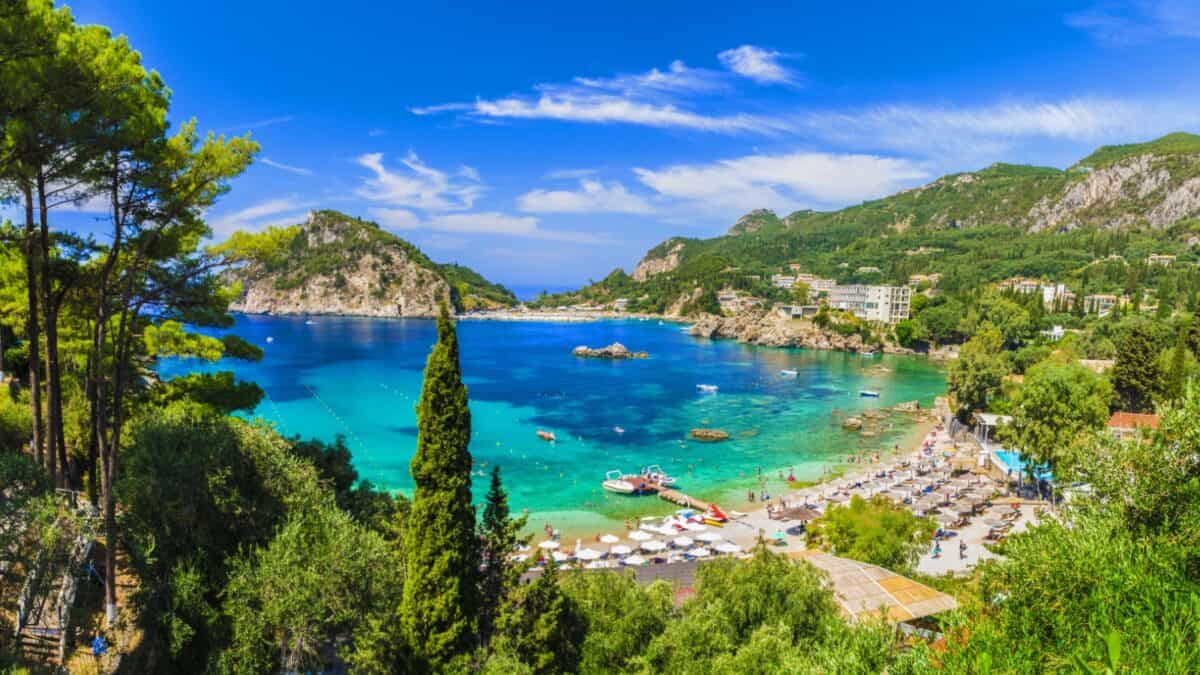 <p>This island was under the rule of France and Great Britain and then returned to Greece in 1864. This makes its architecture and history unique, unlike the rest of the Greek islands.</p><p>Corfu Town is the city you will either fly or ferry into. It has narrow medieval streets, ancient Greek and Roman ruins, and colorful buildings. The island’s entire coastline is dotted with the most beautiful beaches you’ll ever see, with crystal-clear water and mountain backdrops.</p>