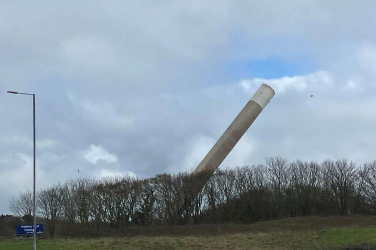 Video shows moment historic Anglesey Aluminium chimney is demolished