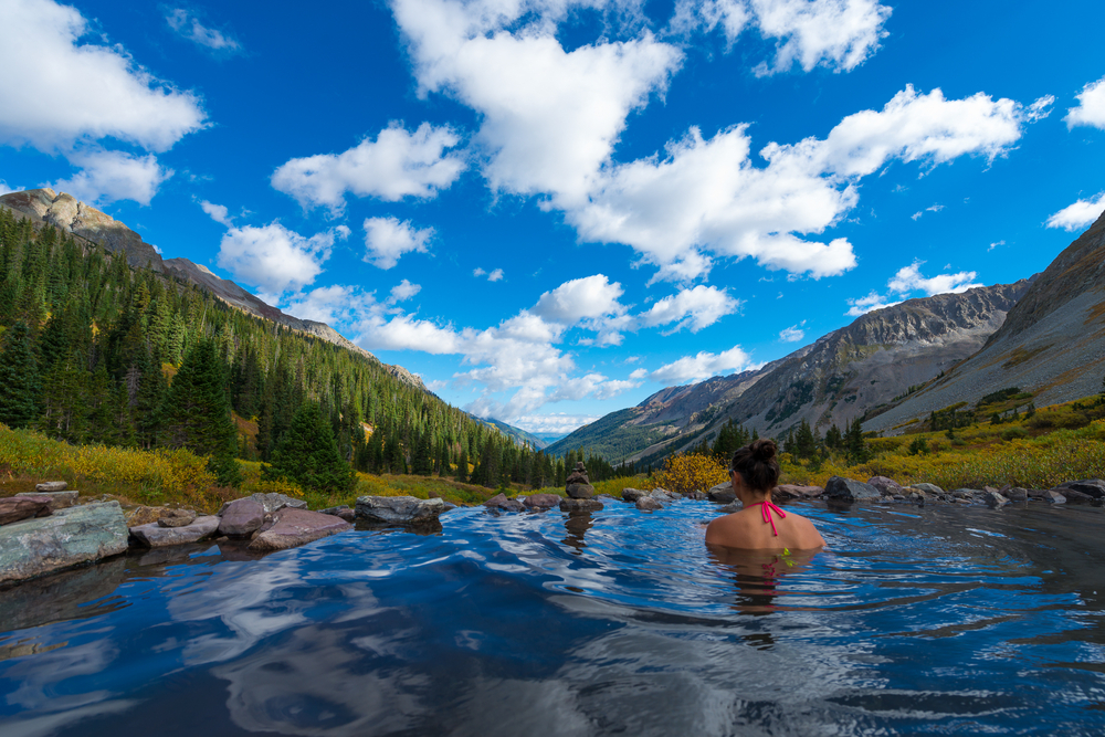<p>Located on the Conundrum Creek Trail near Aspen.</p>  <p>These natural hot springs include one large main pool and a few smaller springs that range in temperatures and are surrounded by a vast green forest and snow-capped mountains.</p>