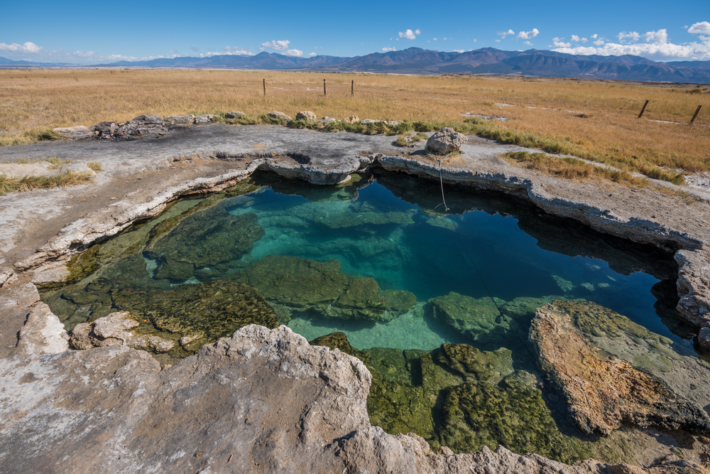 <p>Free parking is available about 150 feet from the spring. The spring is out in the open with no shade.</p>  <p>As well, this hot spring is located <strong>on private property</strong>, so some restrictions apply—such as no unclothed bathing.</p>