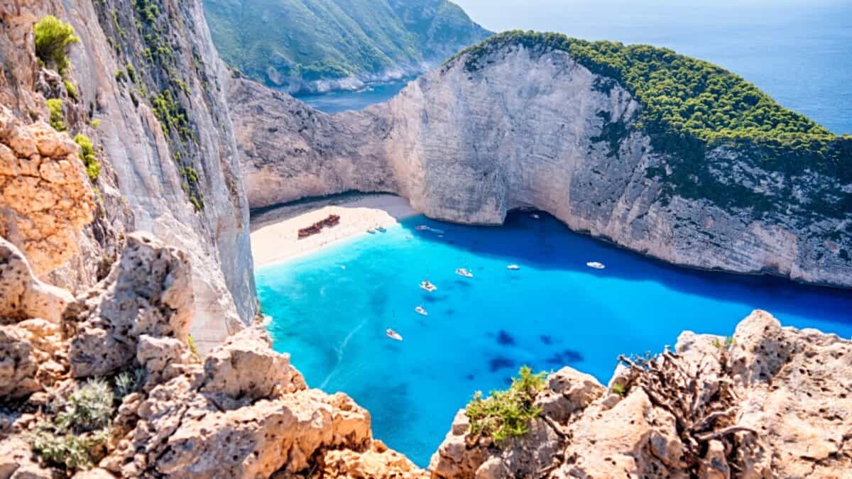 <p>If you are looking for a great Instagram spot with significantly fewer tourists than Santorini, this is the island for you. Zakynthos’s most famous spot is a little beach called Navagio. </p><p>You need to take a boat to it or see it from the 1,000-foot cliffs surrounding it. It’s known as one of the world’s most beautiful beaches and must be part of your Greece itinerary!</p><p>This island is so much more than this one beach. The City of Zakynthos has a promenade lined with little shops, the perfect place to watch the boats come in and out while enjoying a cocktail.</p>