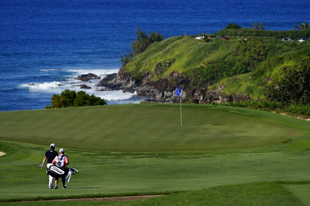 <p>Kapalua’s Plantation Course, designed by Coore and Crenshaw, showcases old-style course features. The par-3 second hole’s subtle design requires strategic play based on wind and pin position.</p>