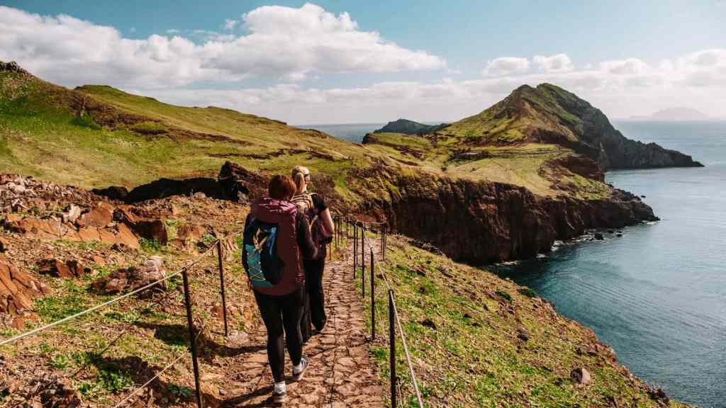 <p>There is no better way to explore Madeira Island than to take this scenic route that cuts through it. The trek begins on the northern coast of Madeira in São Vicente or Porto Moniz and ends on the southern coast in Machico or Funchal, the island’s capital city.</p><p>This trail lets you enjoy this island’s diverse landscape, such as lush forests, high cliffs, rugged mountains, terraced hillsides, and panoramic ocean views. The hike also passes through charming villages, letting tourists experience the culture and traditions of the people of Madeira.</p><p class="has-text-align-center has-medium-font-size">Read also: <a href="https://worldwildschooling.com/european-islands-for-beach-holiday/">Amazing European Islands</a></p>