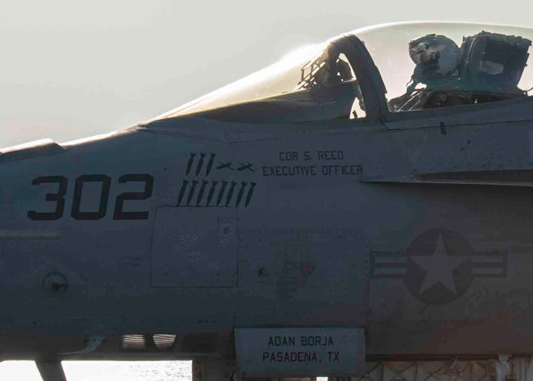 Super Hornet fighter jets on the deck of a US Navy aircraft carrier in ...