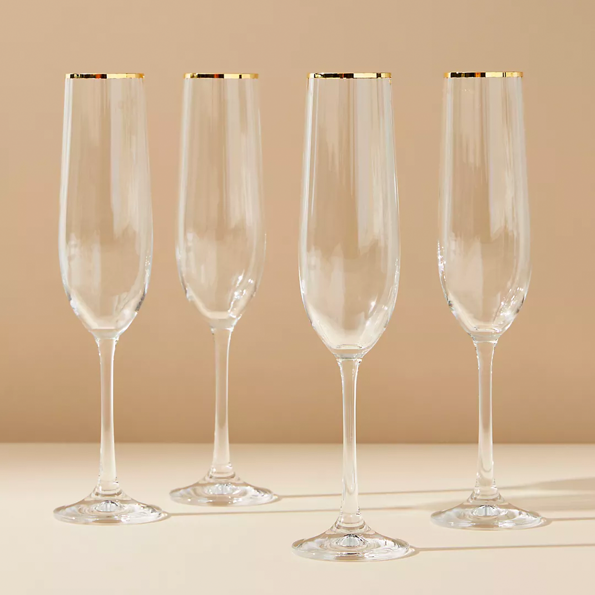 <p>Long after you pop bottles at their graduation party, these cute champagne flutes will keep the celebration going in their first apartment.</p> <p><em>Save when you shop for the best graduation gift ideas with these <a href="https://www.glamour.com/coupons/anthropologie?mbid=synd_msn_rss&utm_source=msn&utm_medium=syndication">Anthropologie promo codes</a></em>.</p> $72, Anthropologie. <a href="https://www.anthropologie.com/shop/waterfall-flutes-set-of-4">Get it now!</a><p>Sign up for today’s biggest stories, from pop culture to politics.</p><a href="https://www.glamour.com/newsletter/news?sourceCode=msnsend">Sign Up</a>