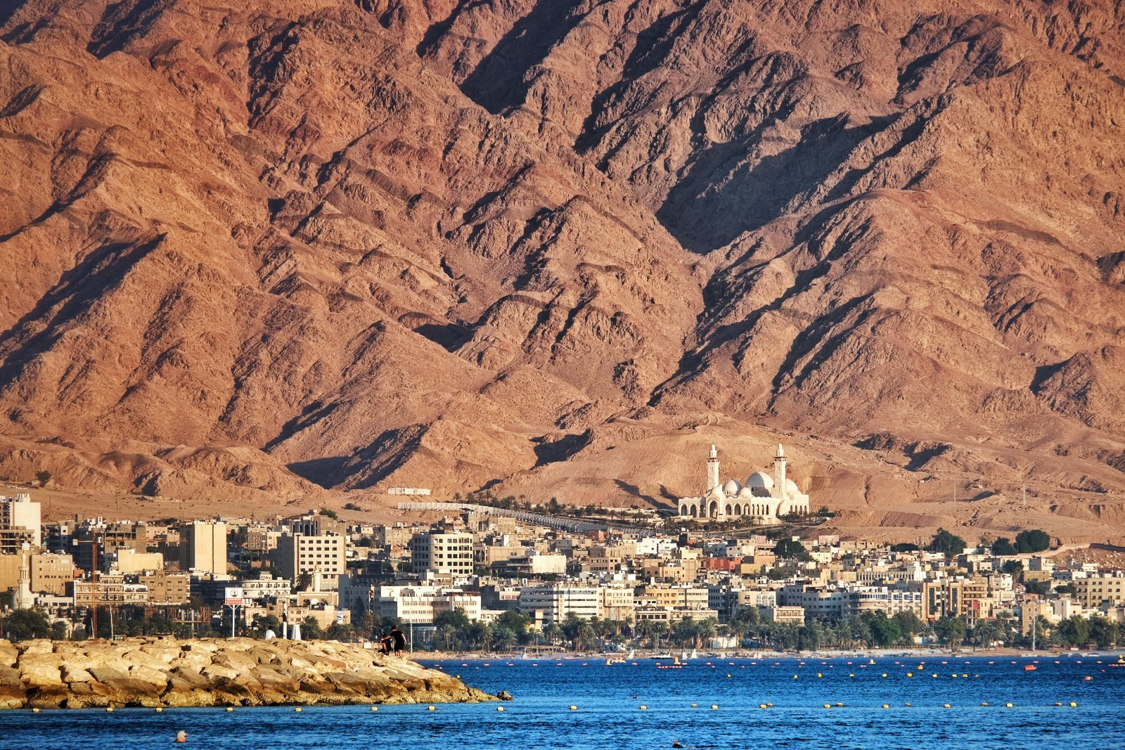 <p><span>Conclude your day with a drive to Aqaba, Jordan’s only coastal city, about two hours from Petra. Enjoy sunset drinks at one of the beachfront resorts and dinner at a local seafood restaurant, where you can savor the fresh catch of the day while overlooking the Red Sea.</span></p> <p><strong>Insider’s Tip: </strong><span>Choose a restaurant on the Corniche for the best sea views and a lively atmosphere.</span></p> <p><strong>How to Get There: </strong><span>Regular buses and taxis connect Petra to Aqaba, making it an easy journey after a day of exploration.</span></p>