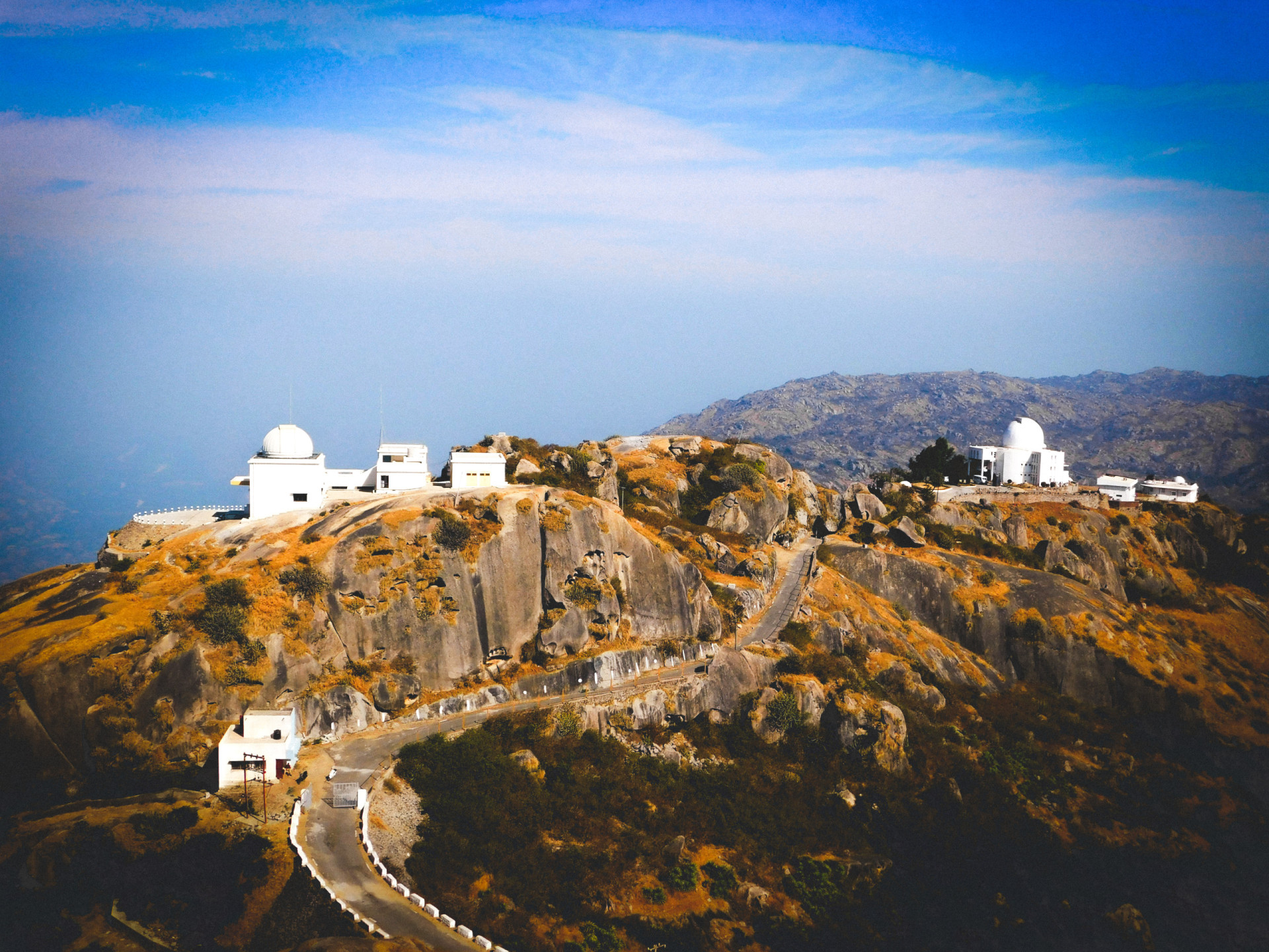 Remote Mount Abu is tucked away in the Aravalli mountain range in Rajasthan and serves as a lofty getaway from the sultry desert climate this northwestern Indian state is notorious for. The destination sits amid lush, green forested hills on the highest peak on the range, Guru Shikhar, at 1,722 m (5,650 ft) above sea level.