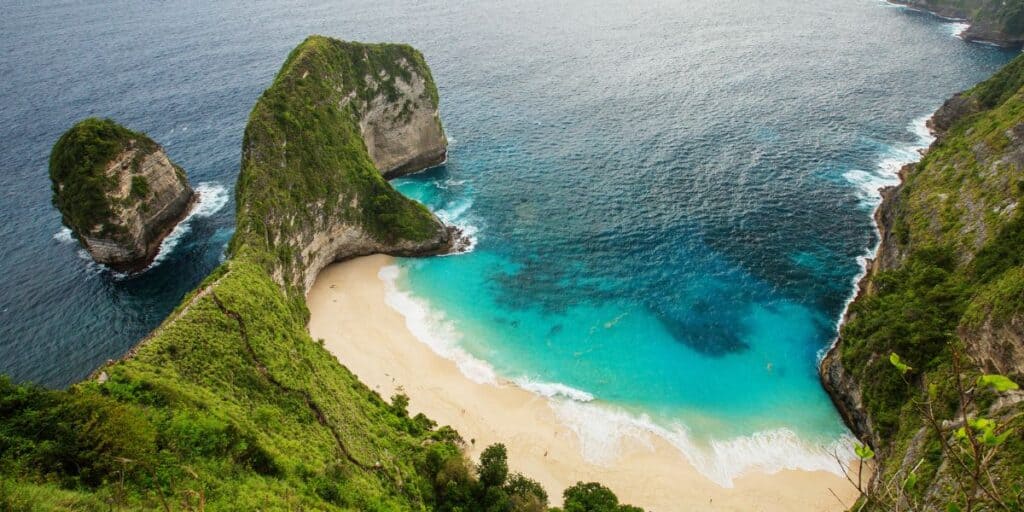 <p><span>This idyllic island lies a 45-minute boat ride off the southeast coast of Bali. You can</span><span> visit Kelingking Beach, famous for its rocky headland shaped like a T-Rex, or go snorkeling off the pristine beaches of Crystal Bay or Atuh Beach. If possible, don’t miss the scenic coastal views from Thousand Island Viewpoint or the rolling green landscapes of the Teletubbies Hills. </span><span>The warm, clear waters of Nusa Penida are also a great location to swim with manta rays. </span></p>
