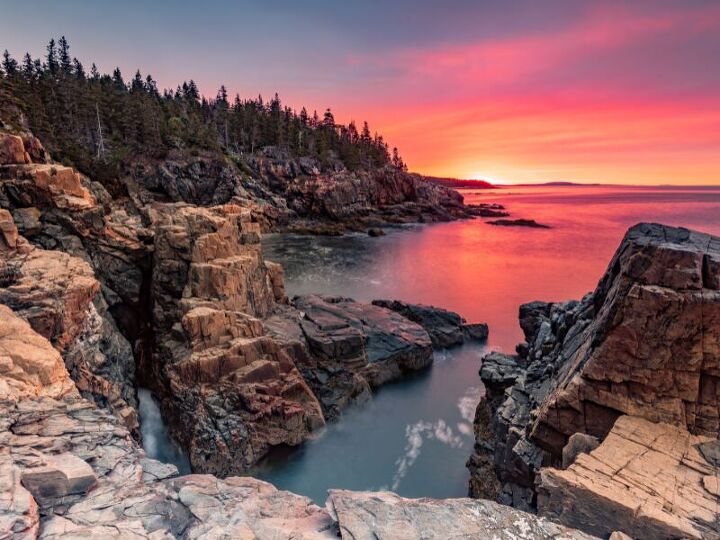 <p><span>Acadia comes alive in the spring with blooming wildflowers and budding trees. The park's extensive trail system includes the Ocean Path, offering dramatic coastal views, and the Precipice Trail, for those seeking a more strenuous climb. </span><em>Image credit: Canva</em></p>