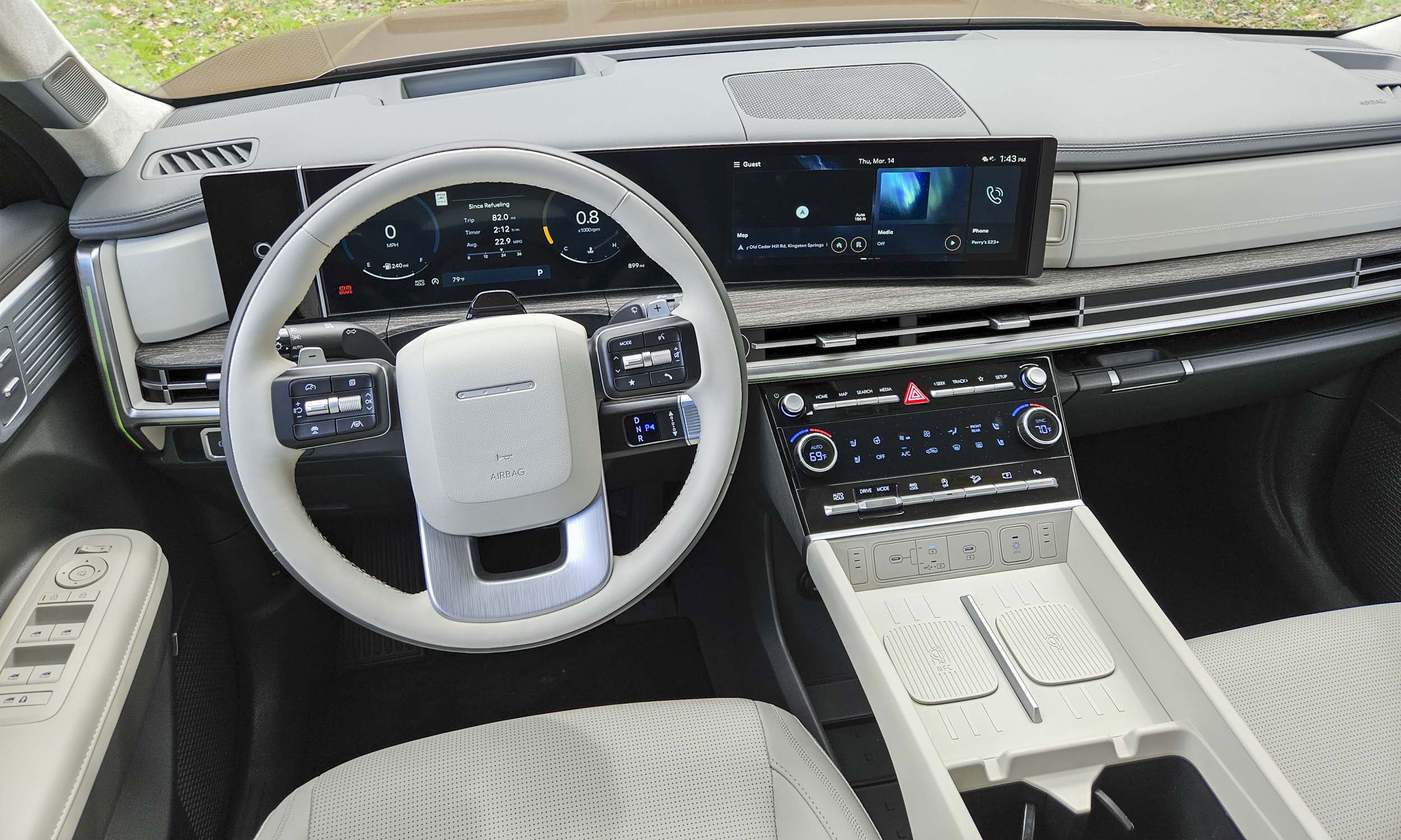 <p>          As part of the redesign, the gear selector has been moved to the steering column, freeing up space in the center console for additional storage. A large space below the console offers room for a large bag or purse, while dual cupholders and available dual wireless phone chargers are easily accessed.         </p>
