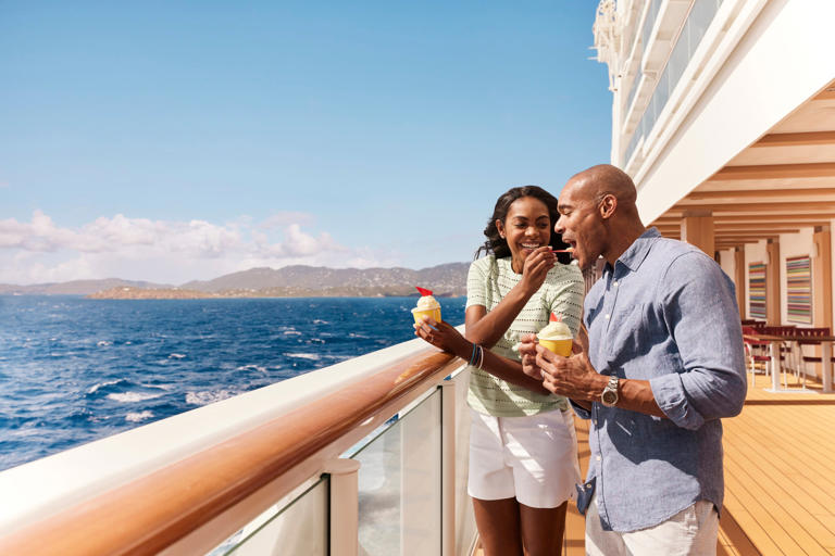 A couple eating ice cream on a Norwegian Cruise Line ship