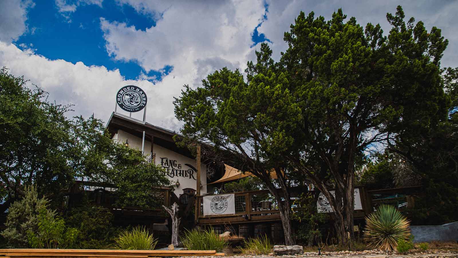 <p><strong>Address: 16221 Crystal Hills Dr Bldg D, Austin, TX 78737</strong></p><p><a href="https://crowdedbarrelwhiskey.com/" rel="nofollow noopener">Crowded Barrel Whisky Co</a> takes their distilling process very seriously, albeit humorously, by incorporating feedback from their fellow whiskey lovers “in all aspects of the whiskey creation from grain to glass.” Rex Williams and Daniel Whittington welcome whiskey “nerds” to their “Whisky Tribe.”</p><p>Their gothic-style tasting room, Fang and Feather, incorporates 2,000 square feet of outside deck space, allowing guests to enjoy their afternoon of whiskey wizardry while sipping on their aged cocktails. If you’re looking for a fantasy-inspired venue for a private event to rent, this might be the place for you.</p>