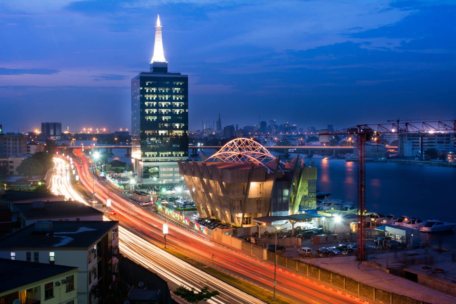 <p class="wp-caption-text">Image Credit: Shutterstock / ba55ey</p>  <p><span>Lagos, the vibrant heart of Nigeria, is a city of stark contrasts and relentless energy. It is where traditional markets coexist with luxury shopping malls and serene beaches border bustling urban neighborhoods. The city’s music scene is a powerful expression of Nigerian culture, with Afrobeats echoing through the lively nightclubs and beachfront bars.</span></p> <p><span>Lagos is also a center for Nollywood, Nigeria’s booming film industry, which has gained international acclaim. The city’s art scene is vibrant, with spaces like the Nike Art Gallery showcasing the work of local artists.</span></p> <p><span>For a taste of Lagos’ culinary diversity, a visit to one of the city’s many markets, such as the Lekki Market, offers an array of local and international flavors. Despite its challenges, Lagos captivates with its dynamic spirit, rich cultural landscape, and the resilience of its people.</span></p> <p><b>Insider’s Tip:</b><span> Experience the city’s nightlife in Ikeja, where live music venues offer an authentic taste of Nigerian music.</span></p> <p><b>When to Travel:</b><span> The dry season from November to March is the best time to visit.</span></p> <p><b>How to Get There:</b><span> Murtala Muhammed International Airport serves as Lagos’s main entry point. Taxis and ride-sharing services are the most convenient ways to get around.</span></p>