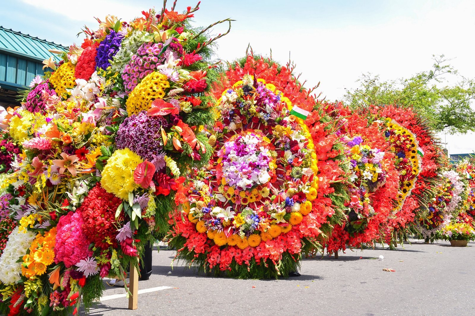 <p class="wp-caption-text">Image Credit: Shutterstock / oscar garces</p>  <p><span>Medellín’s Festival of Flowers is a week-long August celebration featuring parades, live music, and the unique “silleteros” who carry flower arrangements on their backs, showcasing the region’s floral diversity.</span></p> <p><b>Insider’s Tip: </b><span>Attend the Desfile de Silleteros, the festival’s highlight, early to secure a good viewing spot.</span></p> <p><b>When to Travel: </b><span>Early August</span></p> <p><b>How to Get There: </b><span>Medellín is accessible by air, with the festival events spread across the city, easily reachable by metro or taxi.</span></p>
