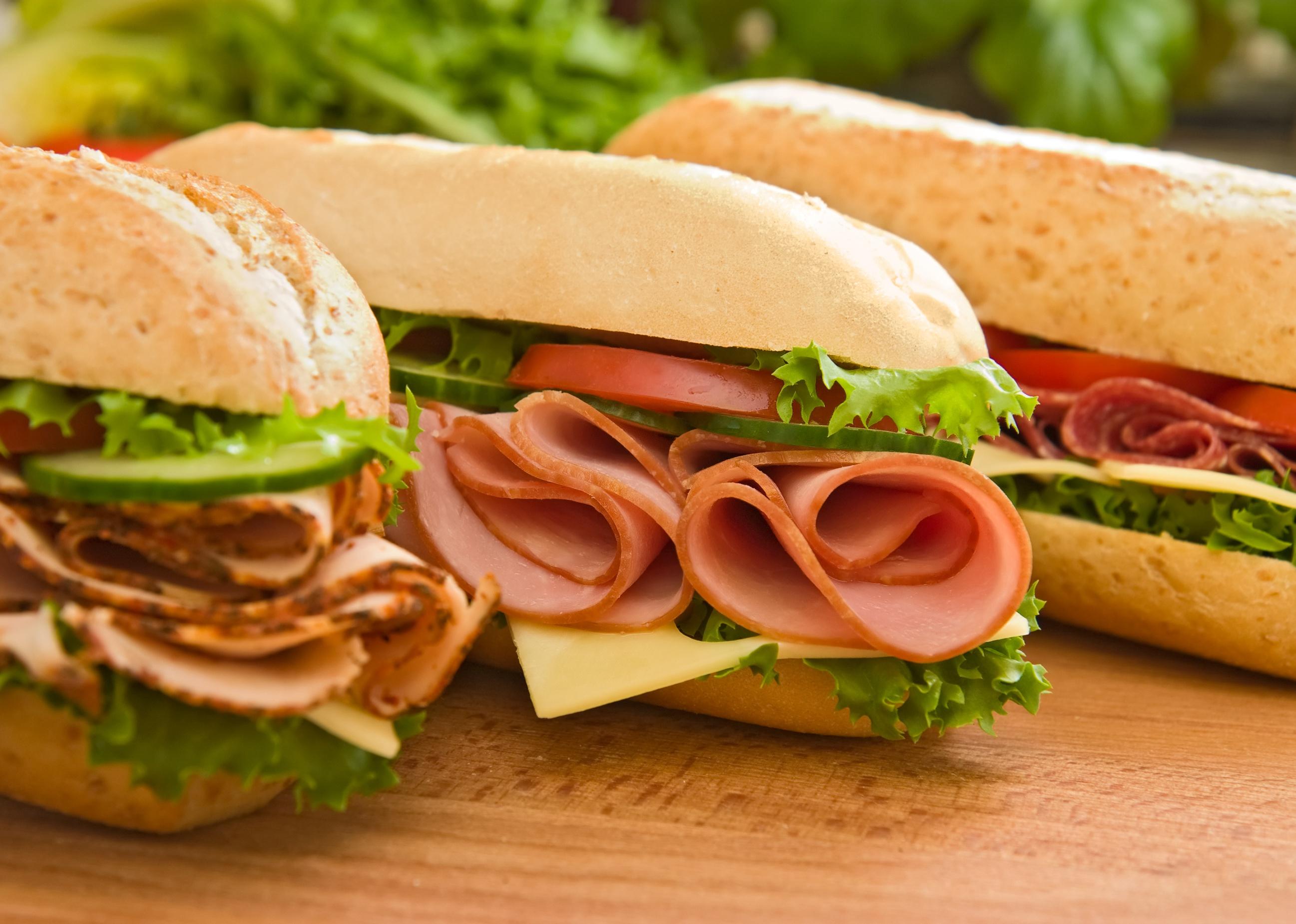 <p>There are many terms for a sandwich made on a long loaf of bread, including "po' boy" and "hero," but the most popular names are "submarine" and "hoagie." Calling these sandwiches "subs" is <a href="https://www.insider.com/words-that-are-different-across-the-us#a-dish-of-cold-cuts-on-long-pieces-of-bread-is-called-a-sub-in-most-parts-of-the-us-except-for-in-parts-of-pennsylvania-where-its-called-a-hoagie-13">most popular nationwide</a>, while "<a href="https://www.britannica.com/topic/hoagie">hoagie</a>" is most commonly used in Pennsylvania. The name is thought to have come from Italian immigrants in Philadelphia working at the Hog Island shipyard during the first World War. They dubbed their sandwiches "hoggies," which later evolved into hoagies.</p>
