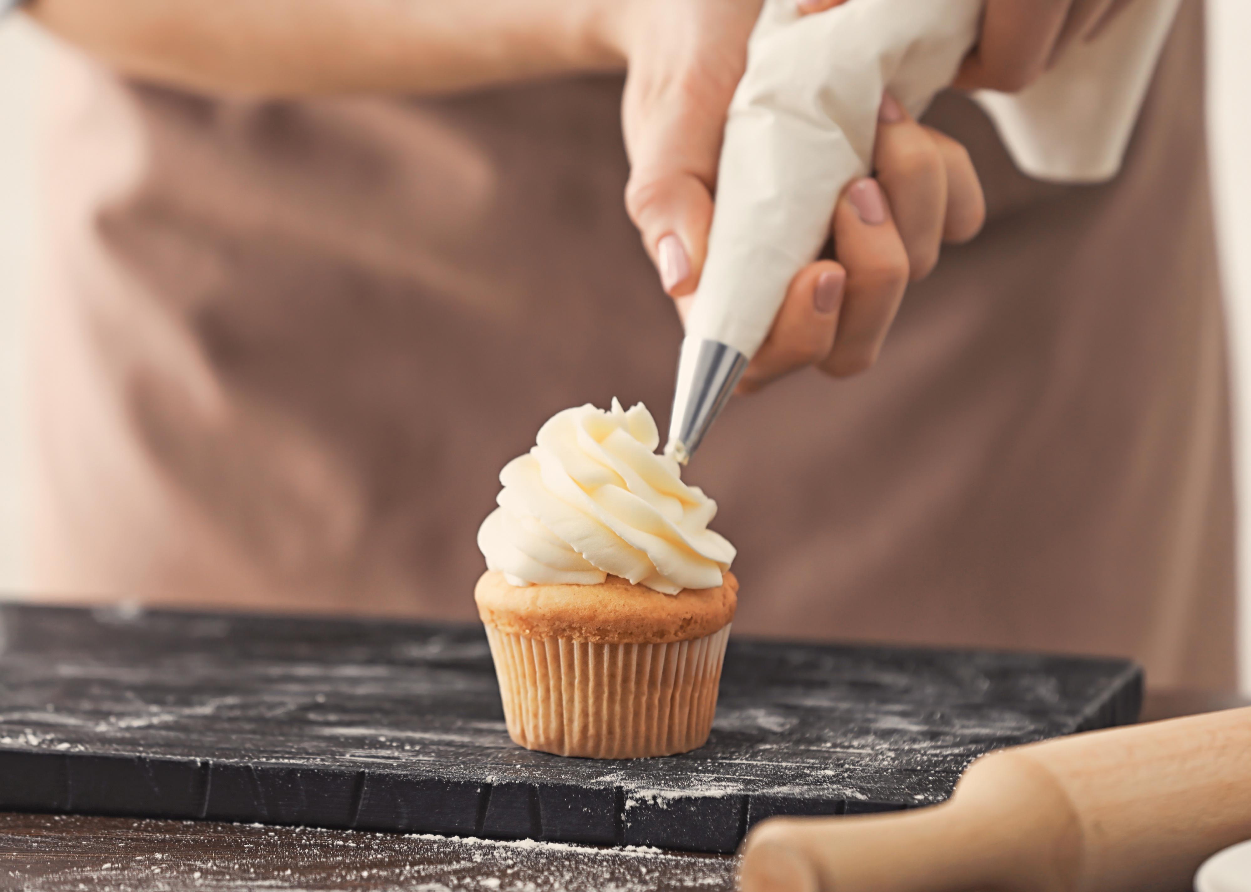 <p>Most Americans recognize either "frosting" or "icing," as the sweet stuff atop a cake, but the term <a href="https://www.insider.com/words-that-are-different-across-the-us#the-buttercream-topping-found-on-cupcakes-can-be-called-frosting-or-icing-12">frosting is slightly more common</a> on the Pacific coast, in the Northeast, and in the Midwest. Icing is so-called because of how sugar granules resemble ice pellets.</p>