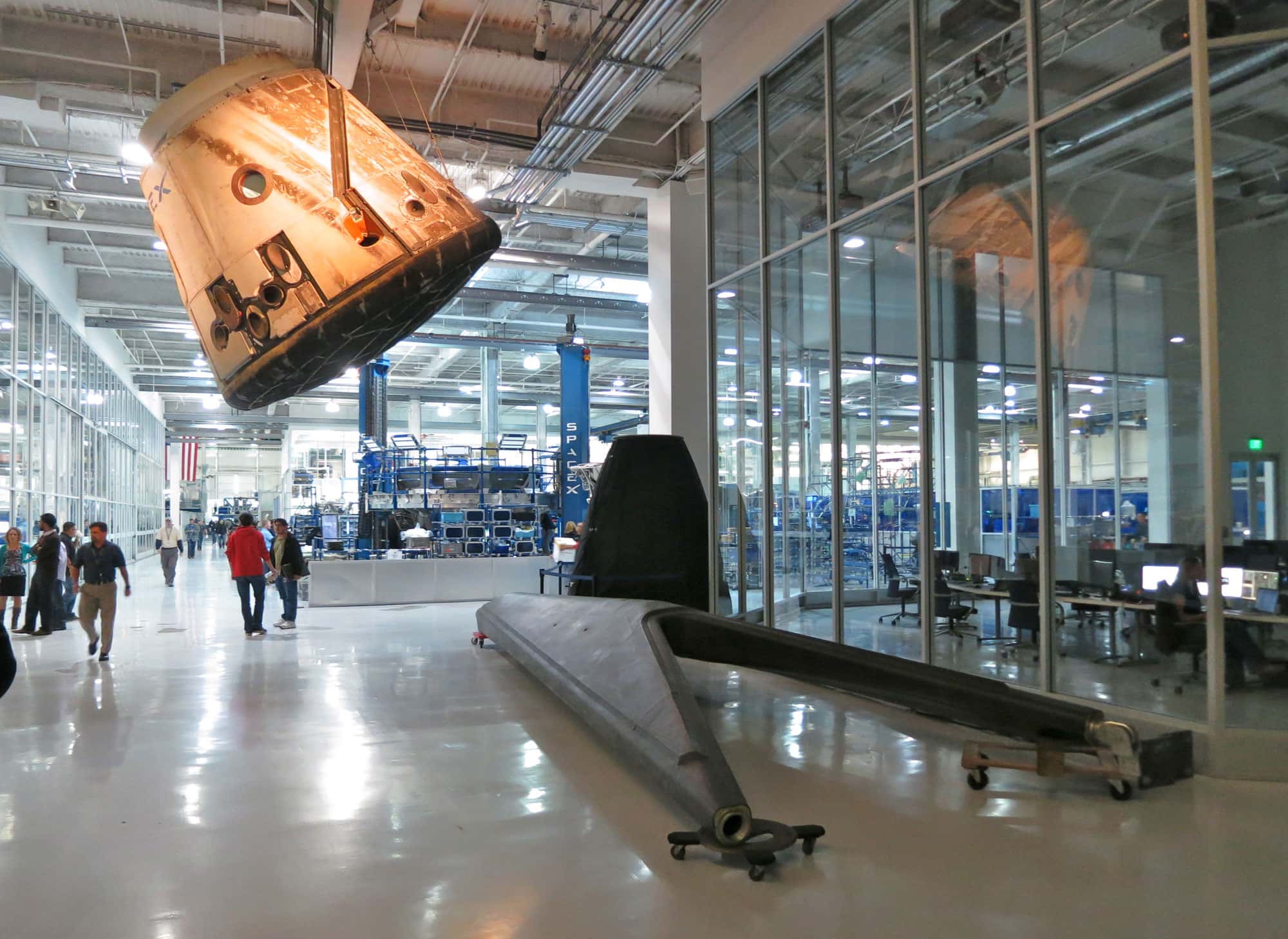 <p>A lot of the floor space in the single level SpaceX headquarters is dedicated to cubicles for its staff. Even Musk himself, the company’s CEO, does not work in a full office with walls and ceilings.</p>
