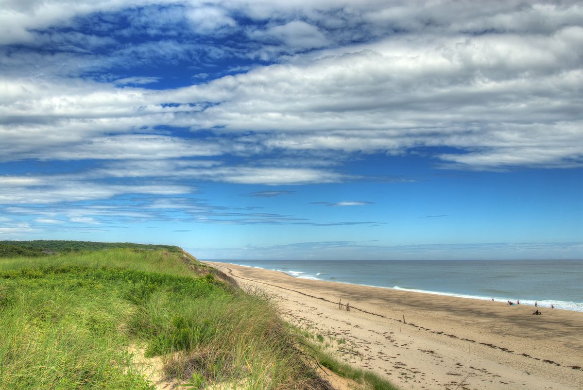 <p>Quinn calls dune-backed Newcomb Hollow Beach “one of Cape Cod’s hidden gems.” After a day swimming in the water and sunning on the golden sand at the northernmost oceanside beach in Wellfleet, stick around to catch the prettiest sunset on the hook-shaped peninsula.</p>