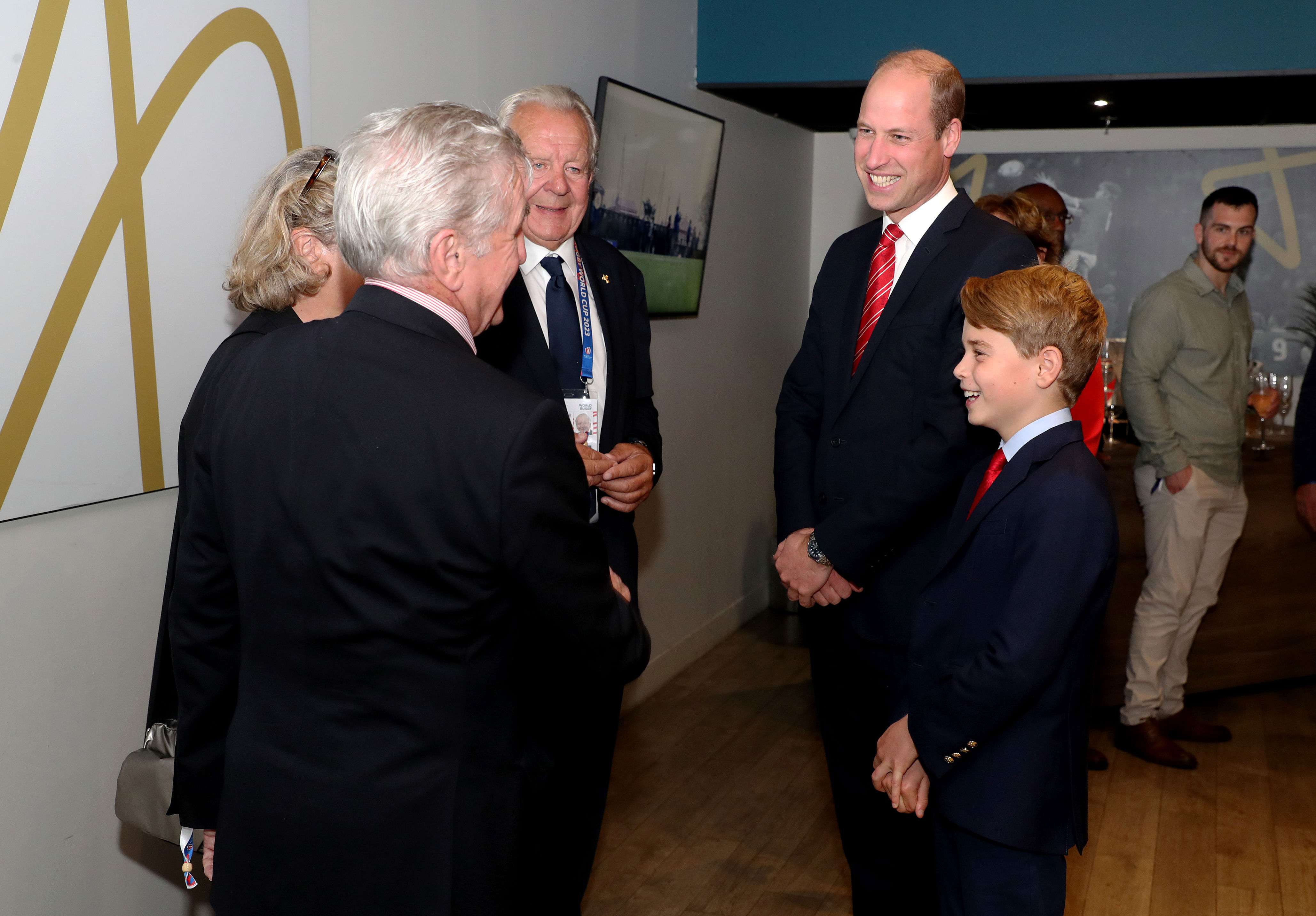 <p>Prince George looked all grown up as he greeted Gerald Davies, who's president of the Welsh Rugby Union, alongside his father, <a href="https://www.wonderwall.com/celebrity/profiles/overview/prince-william-482.article">Prince William</a> -- who's patron of the union -- before the Rugby World Cup 2023 quarter final match at Stade Velodrome in Marseille, France, on Oct. 14, 2023.</p>
