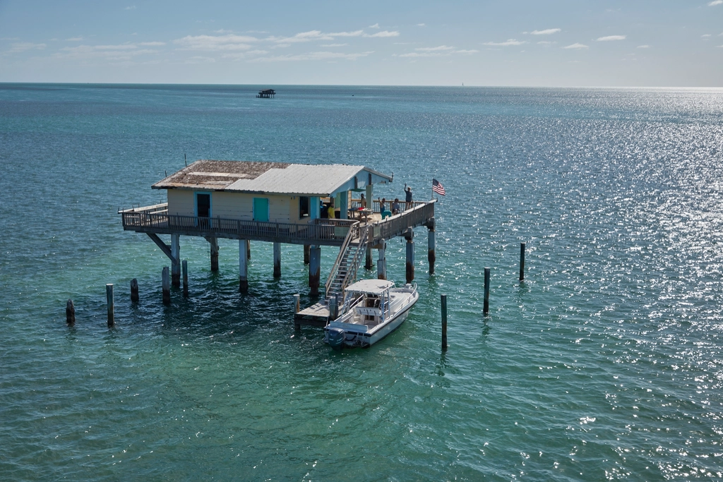 Despite its popularity, Stiltsville faced numerous challenges over the years, including hurricanes, fires, and legal battles over ownership and land use.