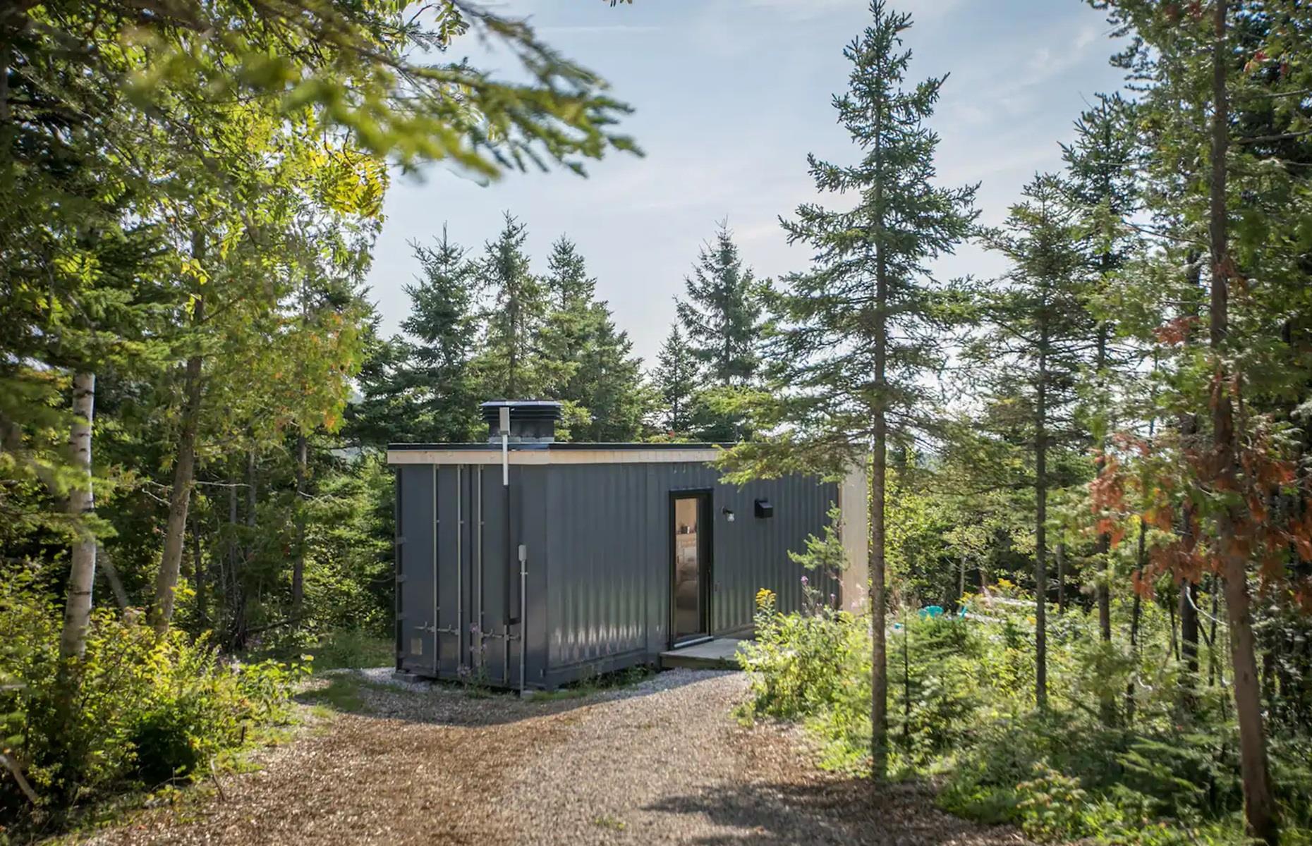 <p>Over in the Les Éboulements municipality of Quebec, you'll find this impressive tiny home – formed from a single steel shipping container. The cool converted home is known as <a href="https://www.airbnb.ca/rooms/647888755288898849?adults=1&category_tag=Tag%3A8186&children=0&enable_m3_private_room=true&infants=0&pets=0&photo_id=1422150332&search_mode=flex_destinations_search&check_in=2024-02-18&check_out=2024-02-23&source_impression_id=p3_1706100028_y3FJA%2BLwmoUla%2BRI&previous_page_section_name=1000&federated_search_id=9300aedf-73df-4331-8d27-f241be0224f1">the Shiship</a> and is nestled inside a dense and tranquil forest.</p>