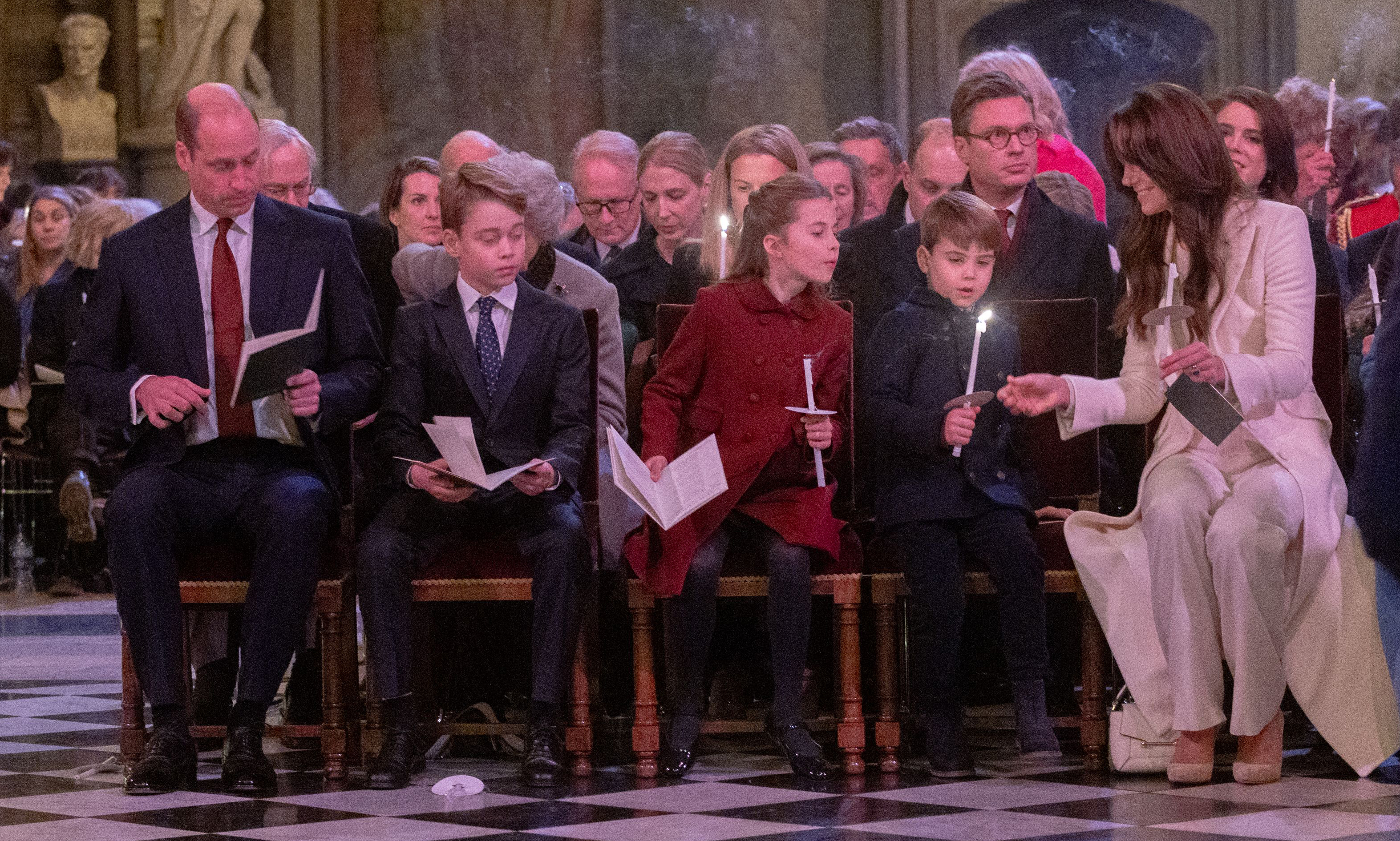 <p><span>Prince George, Princess Charlotte and Princess Kate watched on as Prince Louis took his time extinguishing his candle at the taping of the "Royal Carols: Together at Christmas" TV special -- which they attended with <a href="https://www.wonderwall.com/celebrity/profiles/overview/prince-william-482.article">Prince William</a> -- at Westminster Abbey in London on Dec. 8, 2023.</span></p><p>MORE: <a href="https://www.wonderwall.com/celebrity/royals/trooping-the-colour-2023-king-charles-iii-celebrates-the-first-of-his-reign-752078.gallery">The best photos from Trooping the Colour 2023</a></p>