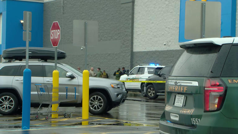 Walmart customer shot by former employee; suspect in custody